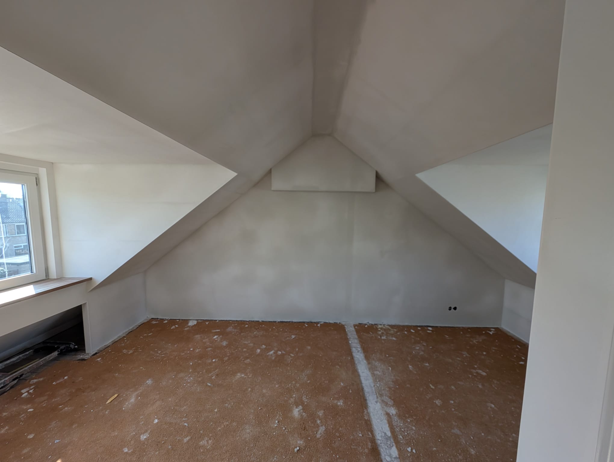 Gladde stucwerk afwerking woonkamer